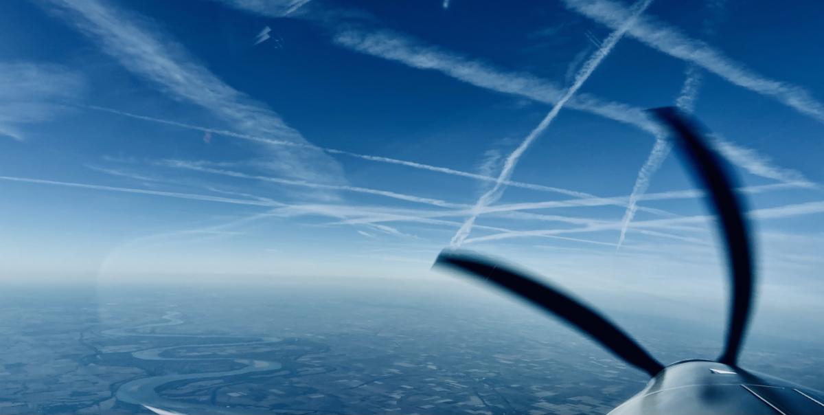 Contrails Over The Mississippi